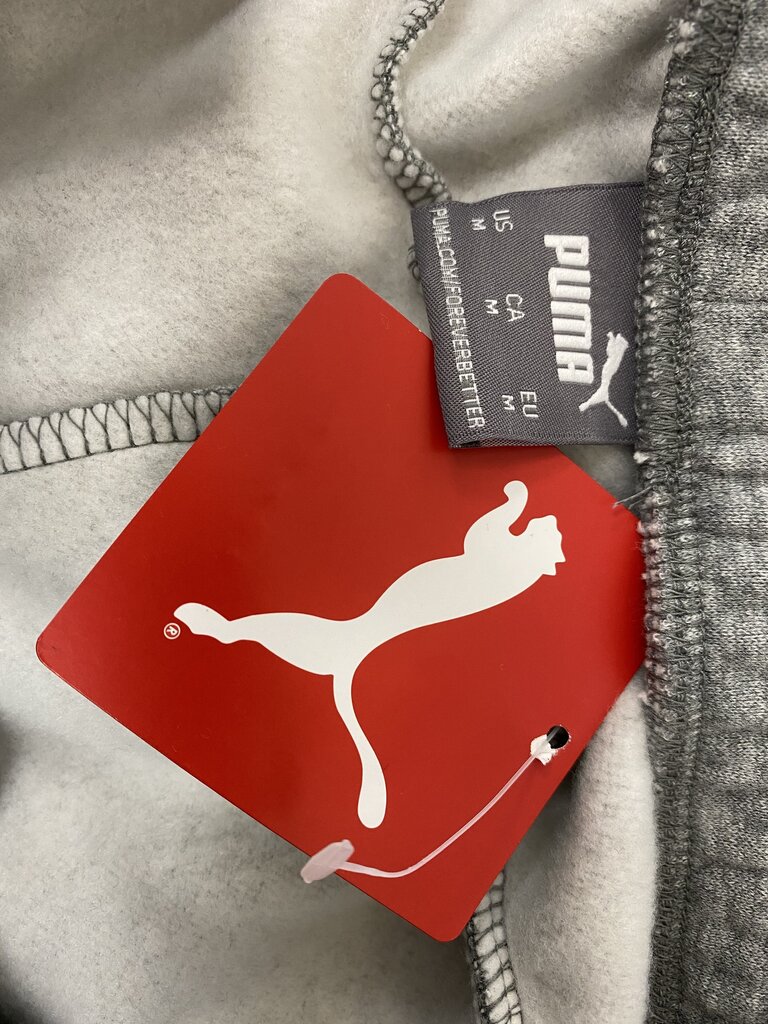 Meeste logoga dressipüksid Puma Logo FPant Sn 00, hall цена и информация | Meeste spordiriided | kaup24.ee