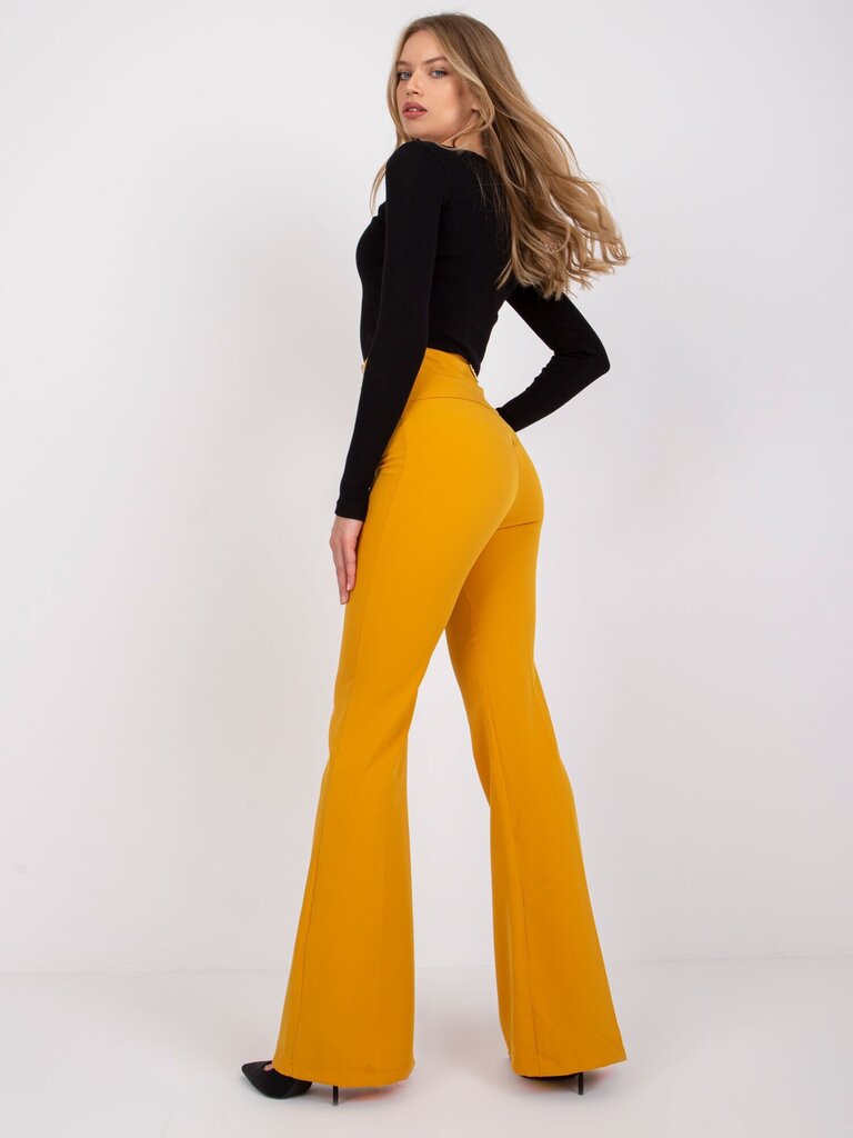 Naise kollasest riidest püksid hind ja info | Naiste püksid | kaup24.ee