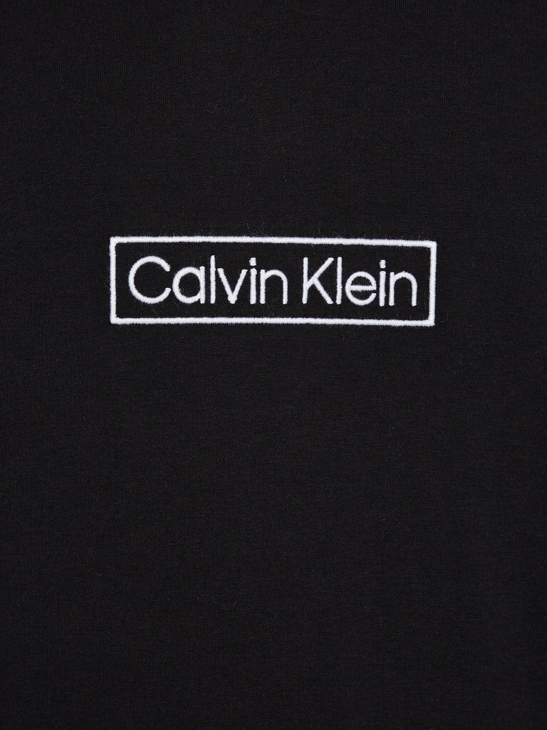Meeste dressipluus Calvin Klein L / S HOODIE, must 000NM2270E UB1 45252 hind ja info | Meeste T-särgid | kaup24.ee