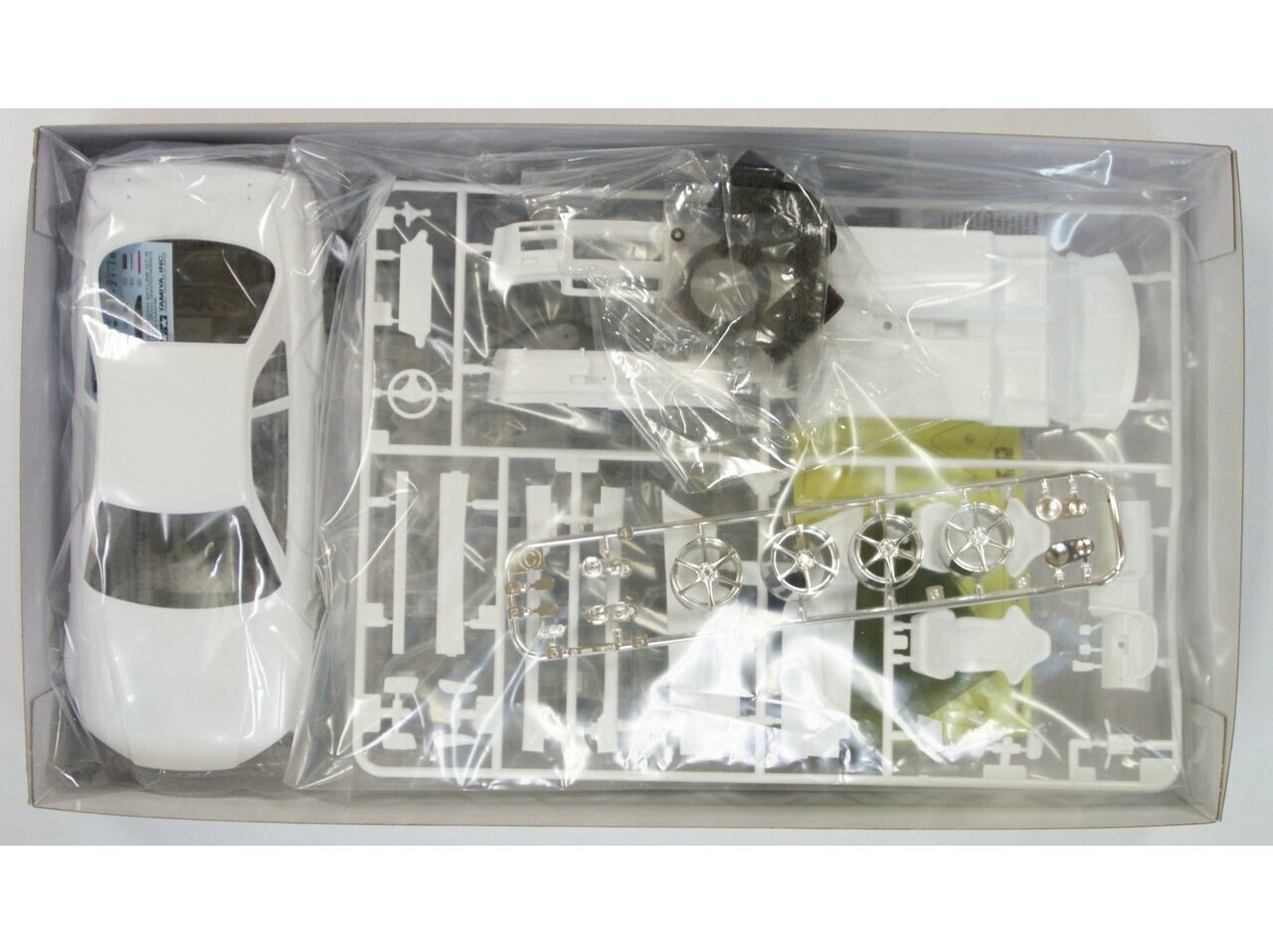 Tamiya - Nissan Skyline GT-R V Spec (R34), 1/24, 24210 hind ja info | Klotsid ja konstruktorid | kaup24.ee