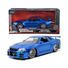 Автомобиль Fast and Furious Nissan Skyline GT-R 1:24 цена и информация | Развивающий мелкую моторику - кинетический песок KeyCraft NV215 (80 г) детям от 3+ лет, бежевый | kaup24.ee