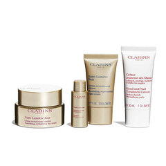 Näonahahoolduskomplekt Clarins Nutri-Lumière: päevakreem, 50 ml + öökreem, 15 ml + näoemulsioon, 10 ml + käte- ja küünehoolduskreem, 30 ml + kosmeetikakott цена и информация | Кремы для лица | kaup24.ee