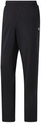 Reebok Spordipüksid Id Train Wvn Ul Pant Black FP9170. FP9170/M цена и информация | Мужская спортивная одежда | kaup24.ee