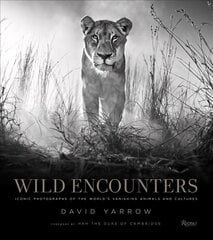 Wild Encounters: Iconic Photographs of the World's Vanishing Animals and Cultures hind ja info | Fotograafia raamatud | kaup24.ee