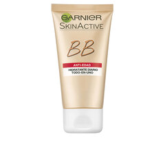 Увлажняющий оттеночный крем Garnier Skin Naturals Антивозрастной Spf 15 цена и информация | Кремы для лица | kaup24.ee