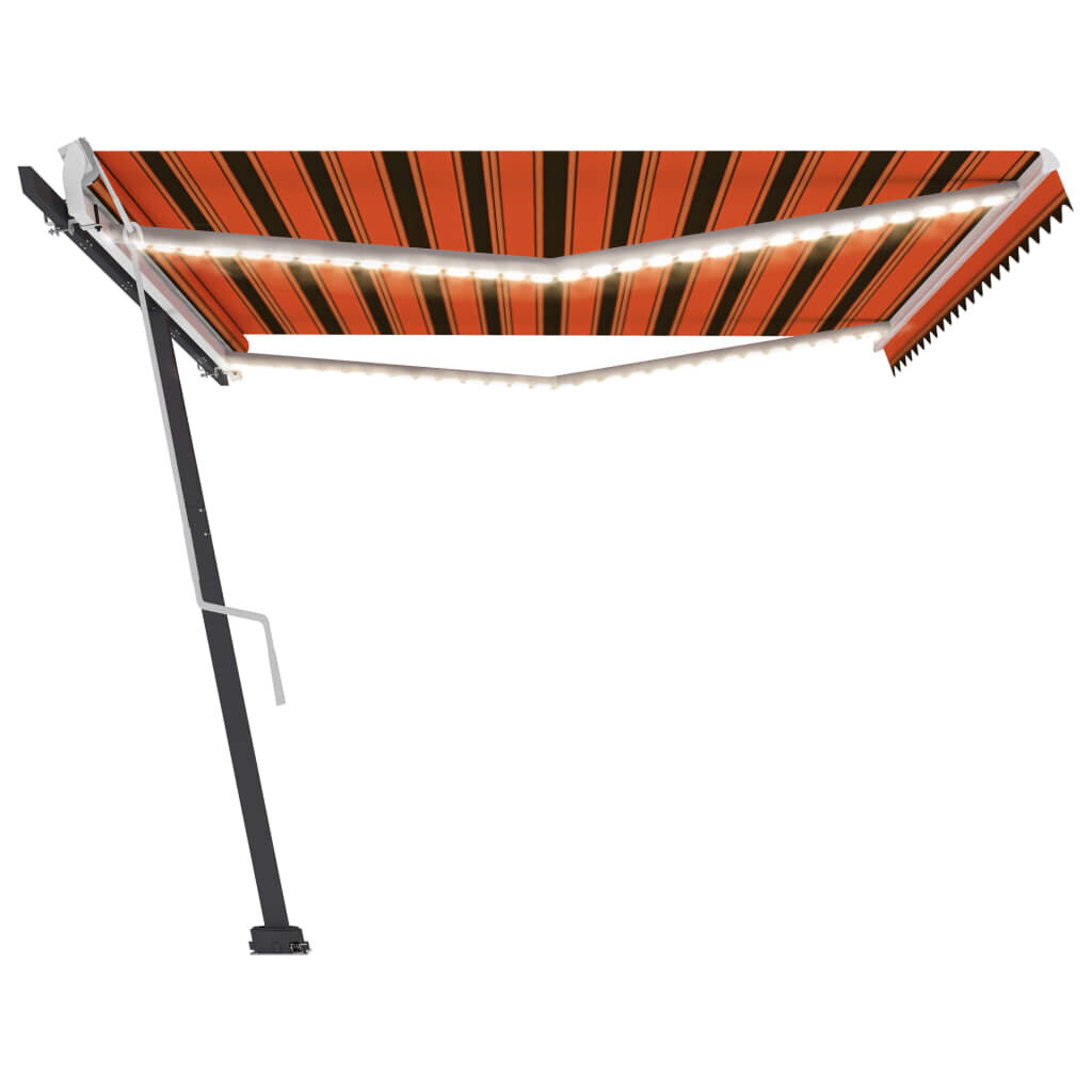 vidaXL käsitsi sissetõmmatav varikatus LED, 500 x 350 cm, oranž/pruun цена и информация | Päikesevarjud, markiisid ja alused | kaup24.ee