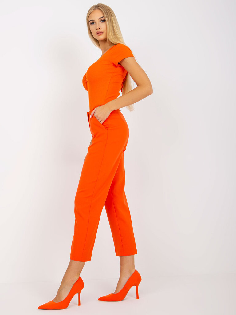 Püksid, oranžid цена и информация | Naiste püksid | kaup24.ee