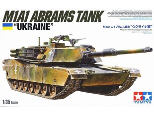 Сборная пластиковая модель. Tamiya - U.S. M1A1 Abrams Tank "Ukraine", 1/35, 25216 цена и информация | Конструкторы и кубики | kaup24.ee