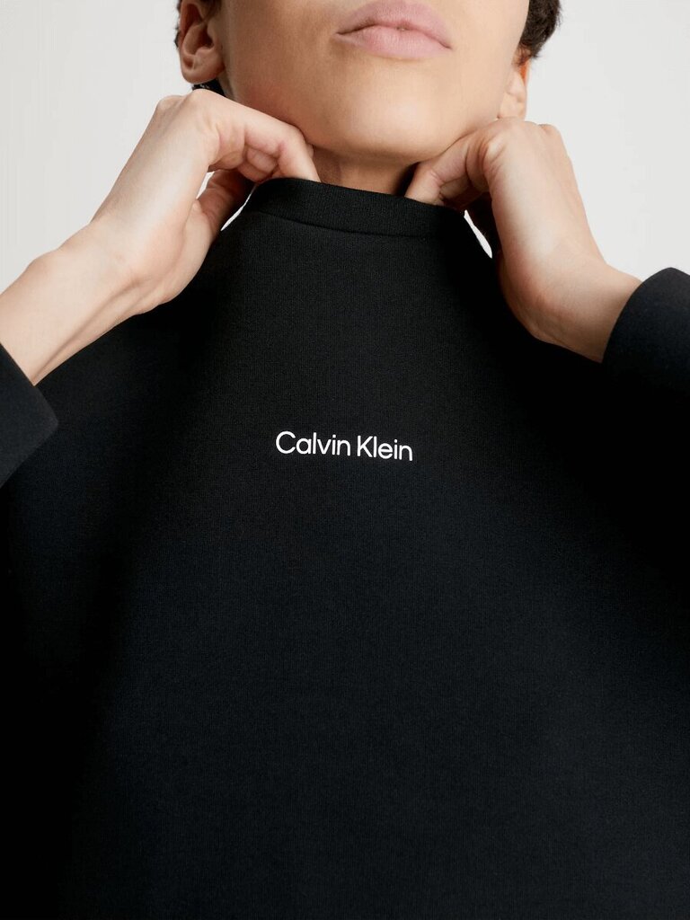 Kampsun naistele Calvin Klein, must цена и информация | Naiste pusad | kaup24.ee