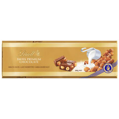 Молочный шоколад с орехами Lindt, 300 г цена и информация | Сладости | kaup24.ee