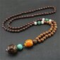 NEPAL BUDDHA MALA Tiibeti puidust kaelakee Käsitsi valmistatud amulett EL79 цена и информация | Kaelakeed | kaup24.ee