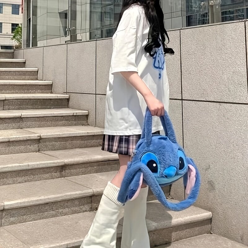 'Autoriseeritud Disney Stitch Plush Bag, armas ja kohev multikas tõmblukuga crossbody kott. Kawaii ja kaasaskantav käekott, ideaalne sünnipäeva- või jõulukingiks.' hind ja info | Koolikotid, sussikotid | kaup24.ee