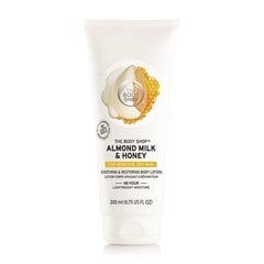 Успокаивающий и восстанавливающий лосьон для тела The Body Shop Almond Milk & Honey 200 мл цена и информация | Кремы, лосьоны для тела | kaup24.ee