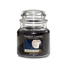 Ароматическая свеча Yankee Candle Classic Medium Jar Midsummer's Night 411 г цена и информация | Подсвечники, свечи | kaup24.ee