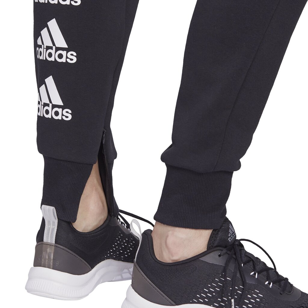 Naiste vabaajapüksid Adidas Stacked Logo Fleece, must hind ja info | Naiste püksid | kaup24.ee