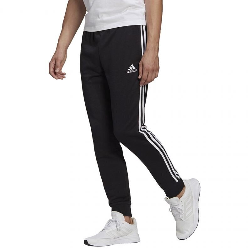 Meeste spordipüksid Adidas Essentials Tapered Cuff 3 Stripes M GK8831, must hind ja info | Meeste spordiriided | kaup24.ee
