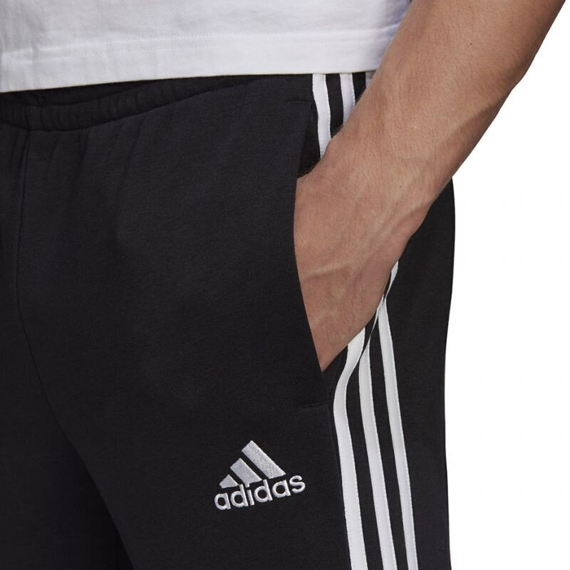 Meeste spordipüksid Adidas Essentials Tapered Cuff 3 Stripes M GK8831, must hind ja info | Meeste spordiriided | kaup24.ee