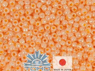 Бисер TOHO® Ceylon Apricot 11/0 (2,2 мм) 10 г. цена и информация | Принадлежности для изготовления украшений, бисероплетения | kaup24.ee