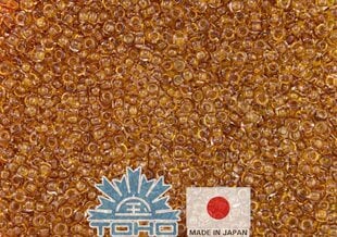 TOHO® seemnehelmed läbipaistev mesi 11/0 (2,2 mm) 10 g. hind ja info | Ehete valmistamine, helmestamine | kaup24.ee