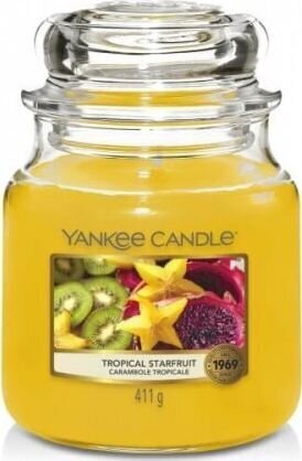 Lõhnaküünal Yankee Candle Tropical Starfruit 411g hind ja info | Küünlad, küünlajalad | kaup24.ee