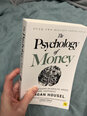 The Psychology of Money : Timeless lessons on wealth, greed, and happiness hind