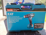 Аккумуляторная ударная дрель-шуруповерт, Makita HP333DWAE 12В 2X2,0Ач